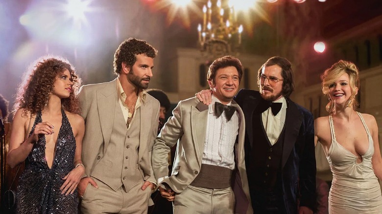 All the core characters from the 2013 movie American Hustle.