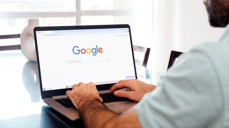 A person using an internet browser on a computer.