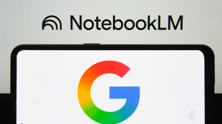 google logo on smartphone with notebooklm logo in background