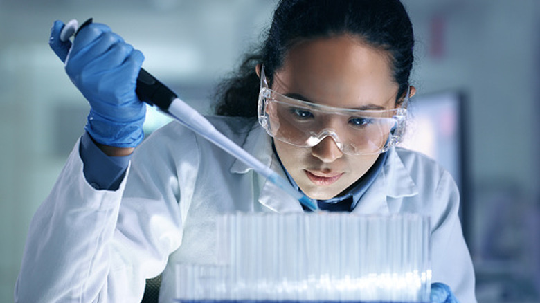 A scientist performs medical research in a laboratory
