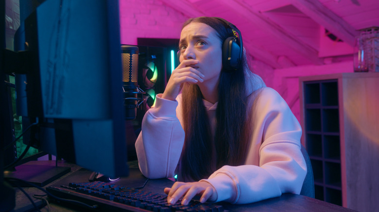 A PC gamer looking frustrated and sad