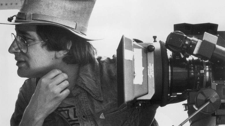 Steven Spielberg and a camera on the set of Close Encounters of the Third Kind