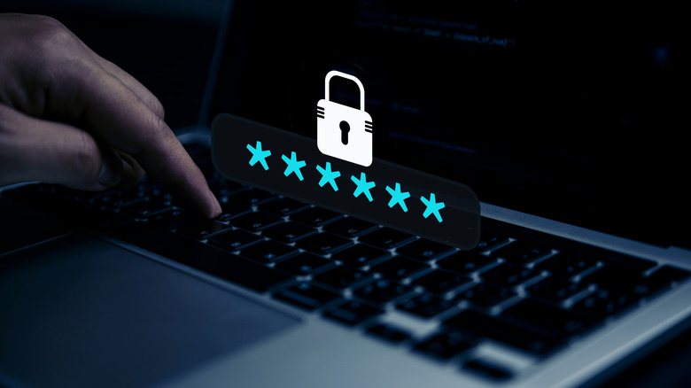 Someone typing in a password with a lock symbol visible.