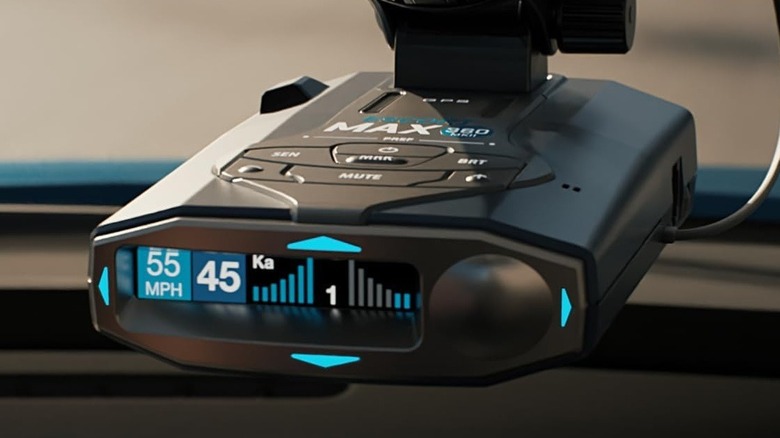 Escort Max 360 MKII Radar Detector with suction mounts and a power cable.