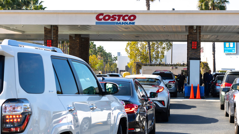 A line of cars at a Costco gas pump