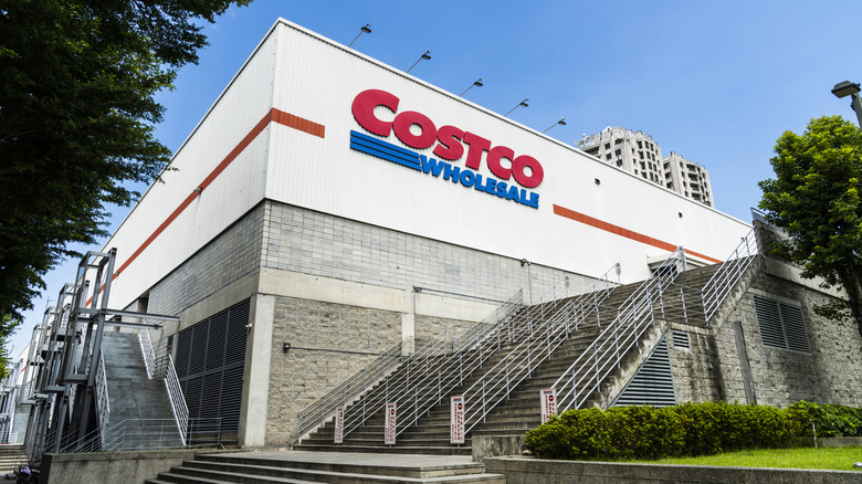 An exterior shot of a Costco Wholesale warehouse in Taiwan, with a large number of steps on both visible sides of the building being prominent in the photo