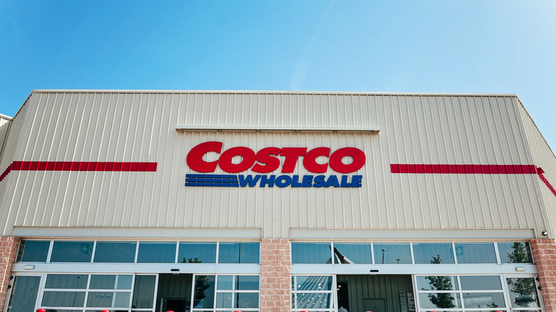 costco warehouse storefront showing the costco logo
