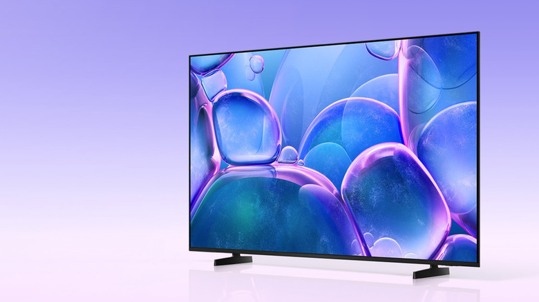 The Samsung U7900F smart TV displaying a close-up image of purple-blue bubbles against a lavender background