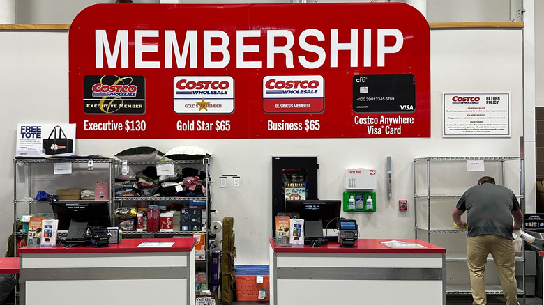 A billboard showing Costco memberships, including the Costco Anywhere Visa Card.