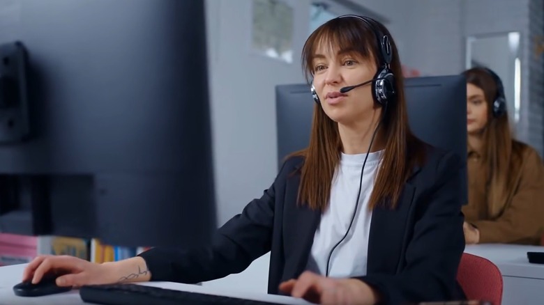 Woman on a tech support telephone call