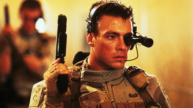 Jean-Claude Van Damme in Universal Soldier, with Dolph Lundgren in the background