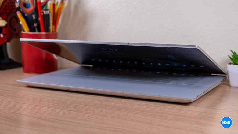 Dell 16 Premium laptop half-opened on a desk