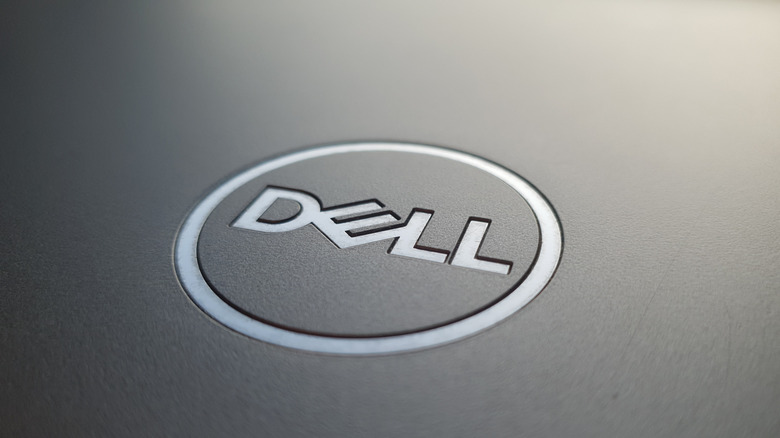 close-up of the Dell logo on the back of a laptop