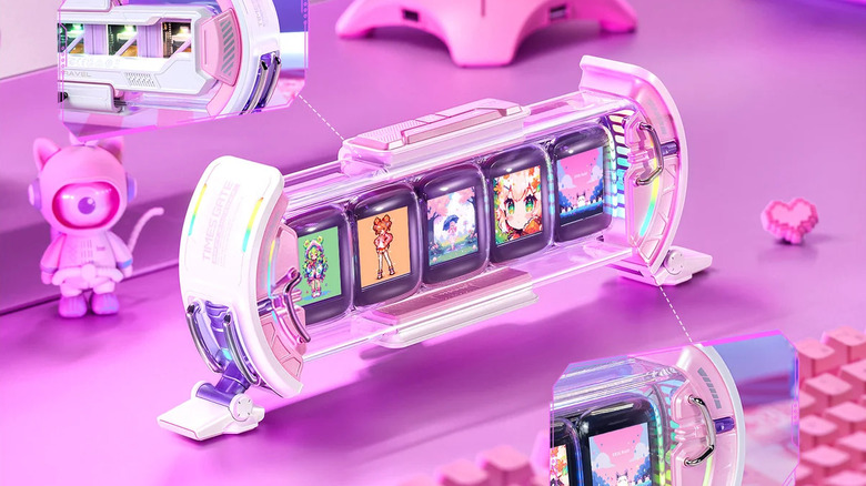 A pink five-screen Divoom Times Gate desktop display featuring pixel art anime characters.