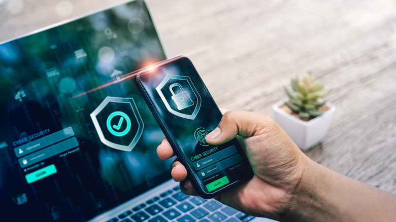 close-up concept of smartphone and PC security screen