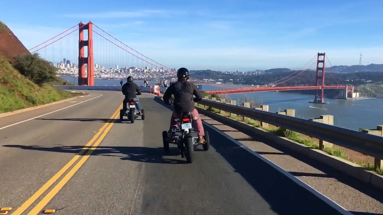The Sway Motorsports scooter being driven on the road outside of San Francisco