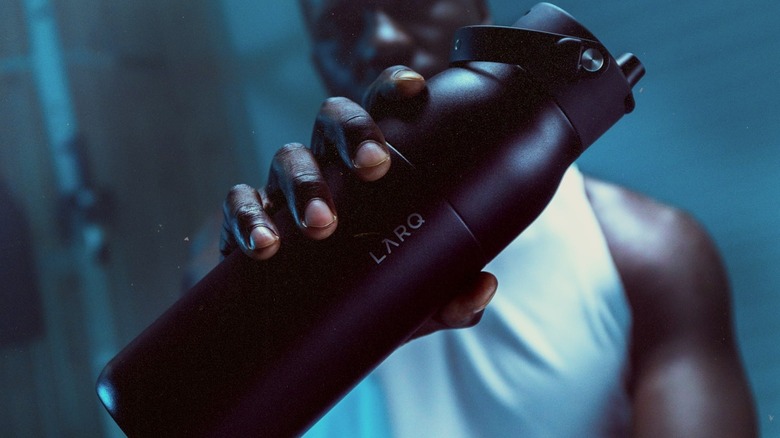 A person showing the LARQ Bottle to the camera