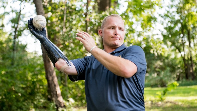 A person throwing a baseball using Psyonic Ability Hand