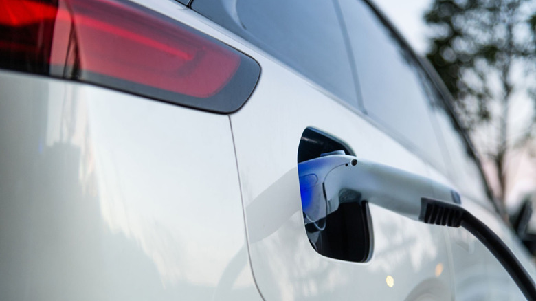 an electric vehicle being charged