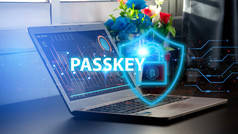 Passkeys digital concept with a laptop in the background
