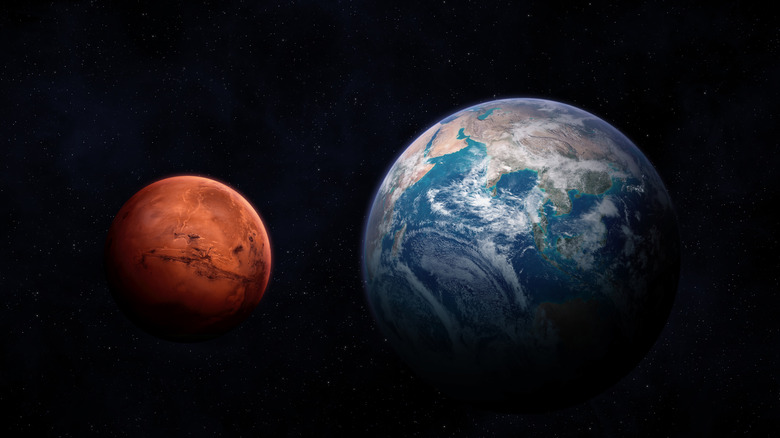 Earth and Mars in space