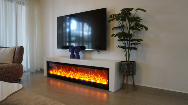 Outside sunlight reflecting off a living room television