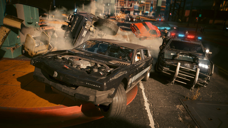Cyberpunk 2077 car crash scene with ray-traced lighting and reflections.