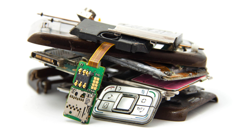A dismantled phone on a white background