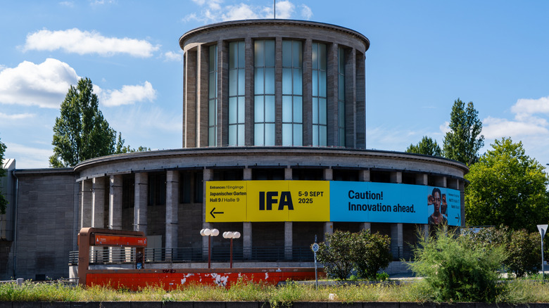 Blue and yellow banner for IFA 2025 on outside of building in Germany