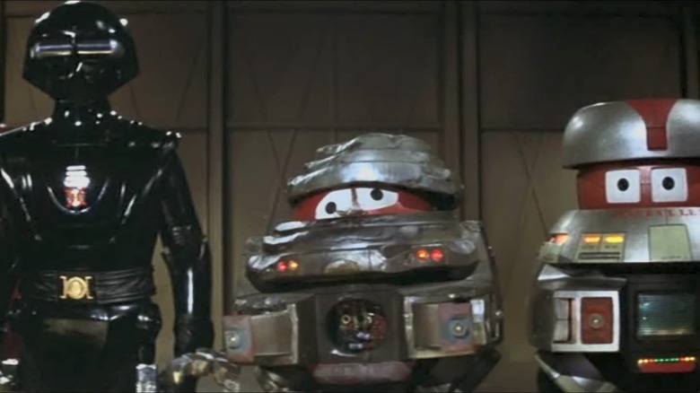 Robots STAR, VINCENT, and BOB in The Black Hole