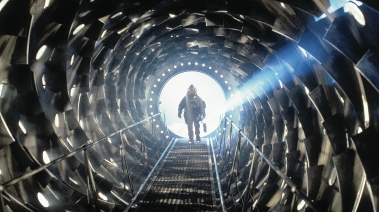 An astronaut walking down a spinning room in Event Horizon