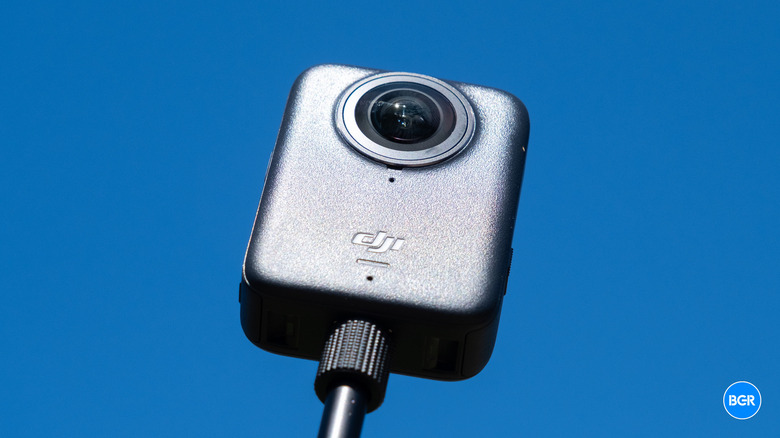 DJI Osmo 360 camera on a selfie stick