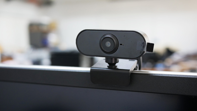 Webcam mounted to top of computer monitor