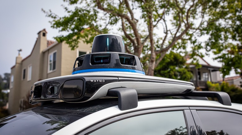 Photograph of the top of a Waymo driverless taxi.
