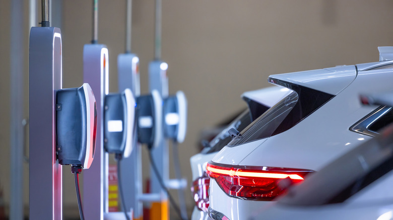 Electric car connected to a charging station