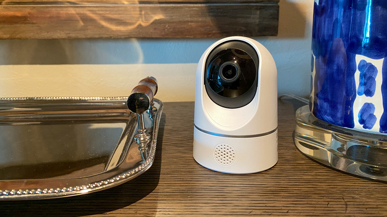 A Eufy indoor camera set up on a table.
