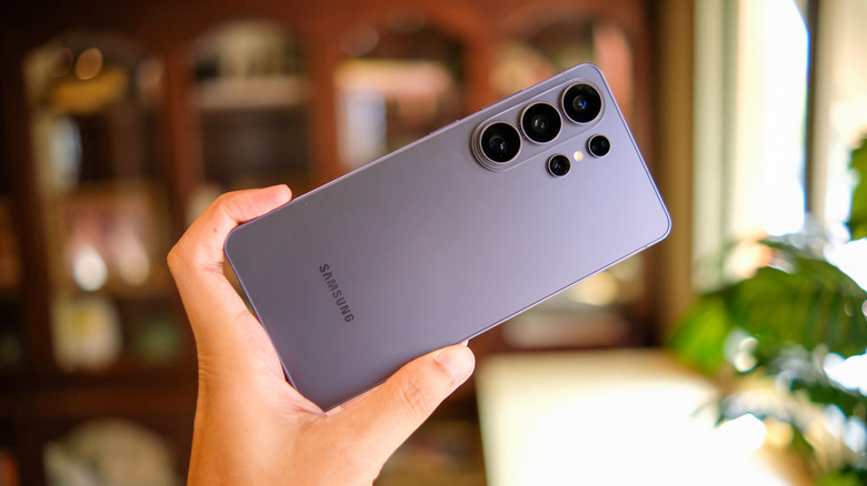 The Galaxy S26 in hand.