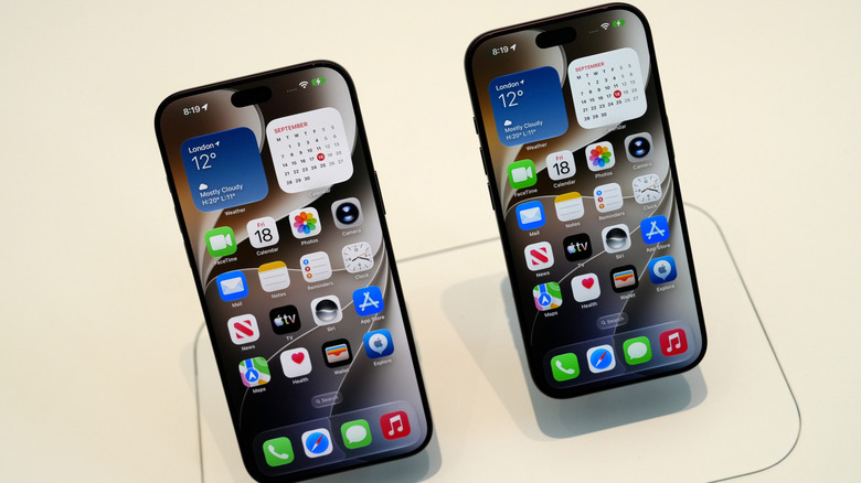 The iPhone 18 Pro Max and iPhone 18 Pro with their screens turned on inside a store.