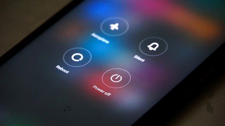 Power menu on a smartphone with reboot option visible