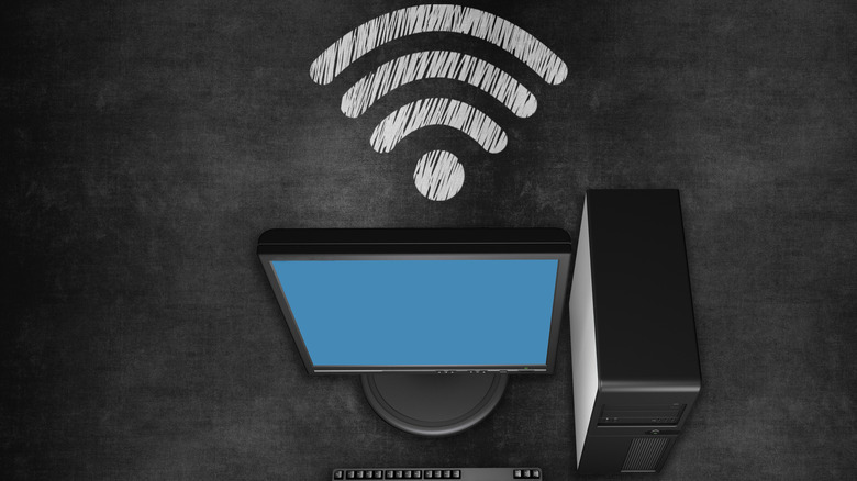 A desktop PC with a Wi-Fi icon hovering over it