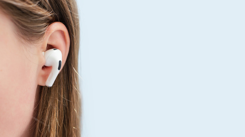 A person wearing AirPods Pro.