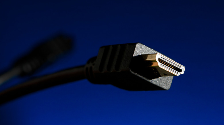 HDMI cable on a dark blue background