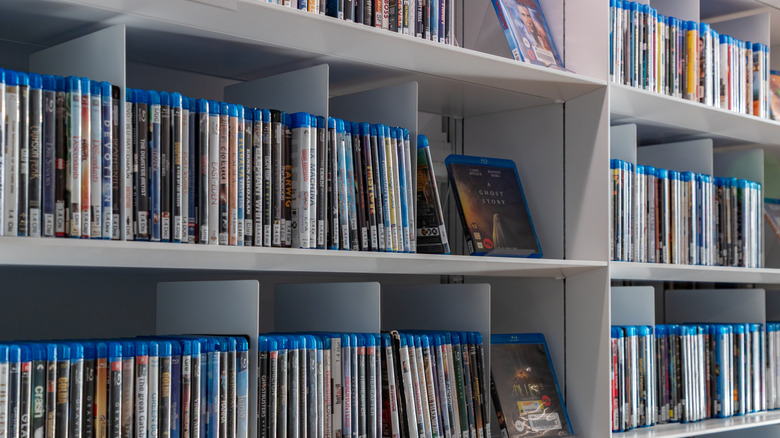 A massive Blu-ray collection stored on tall bookshelves.
