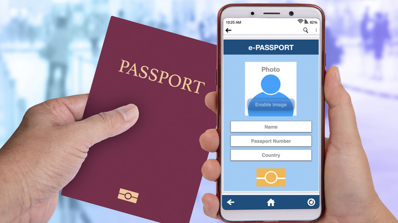A passport held beside a phone with an electronic passport.