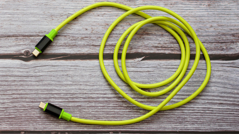A photo of a Usb TYPE C to C cable on a wooden table