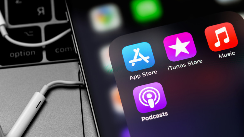 App Store, Apple Music, iTunes Store, Podcasts icon apps on the screen iPhone