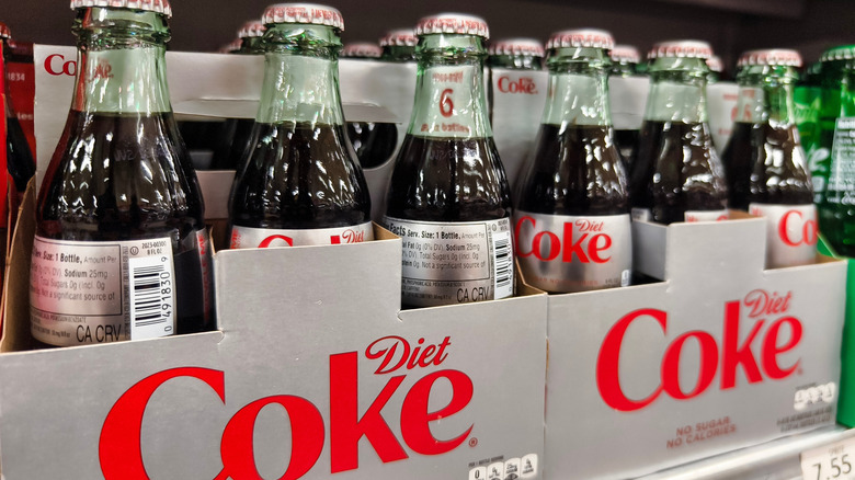 glass diet coke bottles in carrying packages