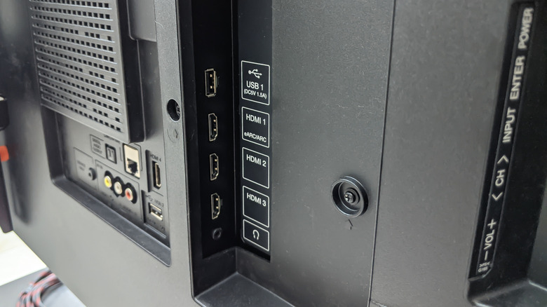 HDMI ports on a back of a TV with a labelled eARC port