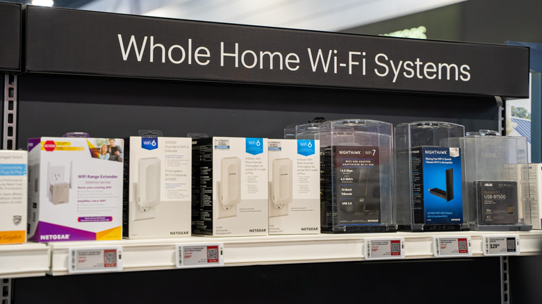 Various mesh Wi-Fi systems on sale in a retail setting