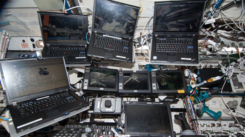 Four ThinkPad T61p laptops aboard the International Space Station.